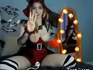 Busty witch masturbating with a sex-toy