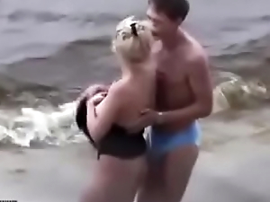 Couple humping to hand a close by nearly beach