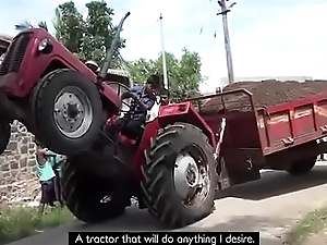 Indian boy is Tractor High jinks Driver