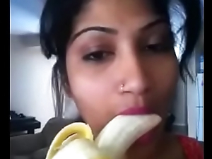 Sexy desi girl sucking banana disposed to cock with moans