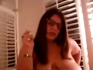 Sexy bbw wife lighting her cig with a match